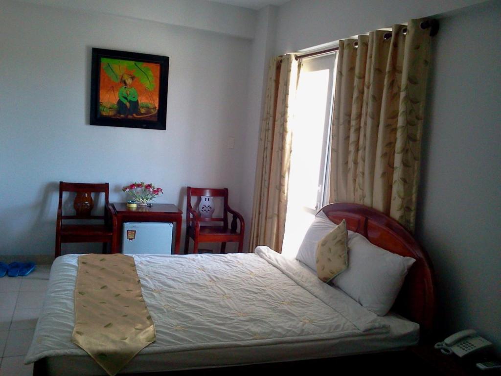 Hotel Vu Quy Nha Trang Pokoj fotografie